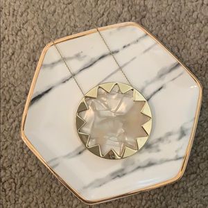 Sun pendant necklace.